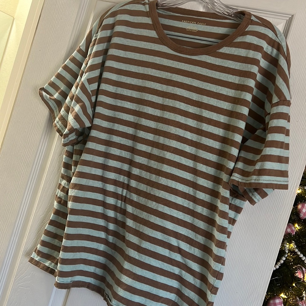 XL blue and khaki striped shirt sleeves t shirt .